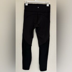 lululemon athletica Black Leggings with mesh bottoms size 6 L25